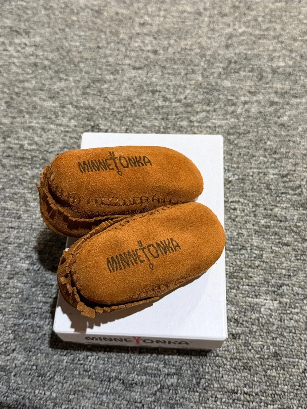 Minnetonka Kids Suede Fringe Moccasins in Brown